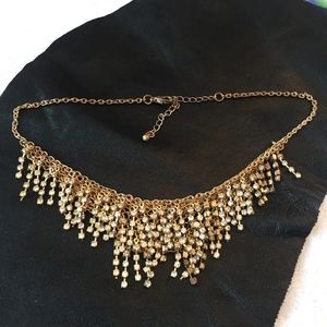 Goldtone CZ statement bid necklace